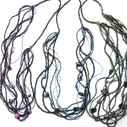 Seven strand long multi bead necklace