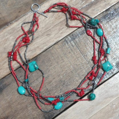 Five strand red and turquoise bead necklace